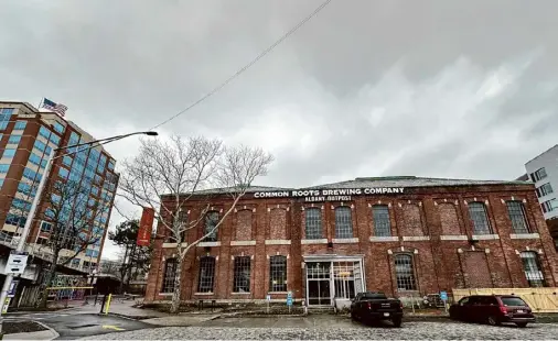  ?? Photos by Steve Barnes/times Union ?? Home to a pumping station that moved water from the Hudson River to reservoirs from 1874 to 1932, the Quakenbush Square building downtown was overhauled to become C.H. Evans Brewing at the Albany Pump Station. It was open from 1999 until the end of October 2023, a few months after founder Neil Evans died.