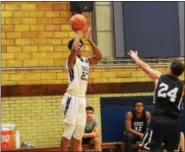  ?? THOMAS NASH - DIGITAL FIRST MEDIA ?? The Hill School’s Caleb Dorsey shoots a 3-pointer during Friday’s game against Kiski School.