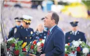  ??  ?? Rio Rancho Mayor Gregg Hull speaks at the 9/11 remembranc­e at Vista Verde Memorial Park.