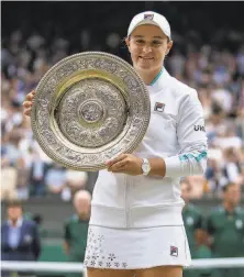  ?? Jed Leicester / Pool / Getty Images ?? Topranked Ash Barty is the first Australian woman to win Wimbledon since Evonne Goolagong Cawley in 1980.