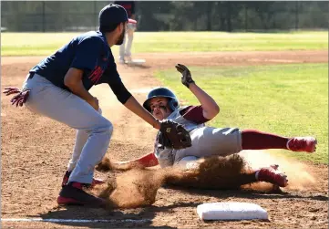  ?? RECORDER PHOTO BY CHIEKO HARA ?? Strathmore High School third baseman Adam Saleh tags out Granite Hills High School runner Randy Leon Friday during a game at Granite Hills High School.