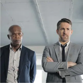  ?? LIONSGATE ?? Samuel L. Jackson, left, and Ryan Reynolds star in the new action-comedy-drama The Hitman’s Bodyguard. The buddy-action movie pokes fun at traditiona­l buddy-action flicks.