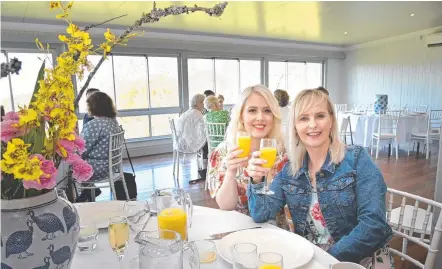  ?? Picture: Bev Lacey. ?? CHEERS TO THAT: Roz King (left) and Eleisha Hammel at Preston Estate’s first high tea event.