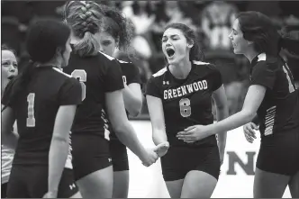  ?? NWA Democrat-Gazette/CHARLIE KAIJO ?? Greenwood’s Abby Cagle (6) celebrates with teammates during their volleyball match Oct. 4 at Siloam Springs High School’s Panther Arena in Siloam Springs. Cagle is one of several options in a potent Lady Bulldogs’ offense for the defending state champions.