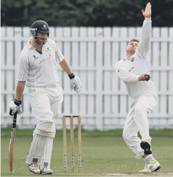  ??  ?? Seaham Harbour’s Michael Stuart races in on the way to taking three wickets at Boldon on Saturday.