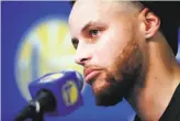  ??  ?? Stephen Curry talks about his knee injury, which will keep him out for at least the first round of the postseason.