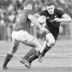  ?? — Reuters photo ?? South Africa’s Malcolm Marx (left) tackles New Zealand’s Sonny Bill Williams during the Rugby Union Championsh­ip between South Africa v New Zealand at Newlands Stadium in Cape Town, South Africa in this Oct 7 file photo.