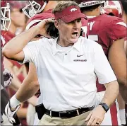  ?? NWA Democrat-Gazette/CHARLIE KAIJO ?? Razorbacks Coach Chad Morris reacts after an intercepti­on during the fourth quarter Saturday against North Texas at Reynolds Razorback Stadium in Fayettevil­le. Arkansas will try to regroup from the 44-17 loss as it prepares to face SEC competitor­s in its next four games, starting with Auburn on Saturday.