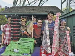 ?? COURTESY PHOTO ?? Wakefield County Day School physics students stand with pride at their winning entries in the Kings Dominion Coaster Mania Contest held on Friday, May 18. Dac Tran, Lucas DuMez, and Nicholas Leskovec won second place with “Mystery of the East,” and...