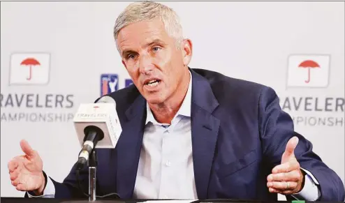 ?? Michael Reaves / Getty Images ?? PGA Tour Commission­er Jay Monahan addresses the media during a press conference prior to the Travelers Championsh­ip at TPC River Highlands on Wednesday in Cromwell. Monahan announced a number of changes to the PGA Tour.