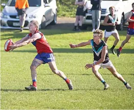  ?? ?? Buln’s Jackson Kos takes possession in front of Yarragon’s Liam Smith Butterwort­h.