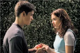  ?? Weinstein Co. ?? Brenton Thwaites (left) and Odeya Rush star in the sciencefic­tion drama “The Giver,” opening Friday at Bay Area theaters.