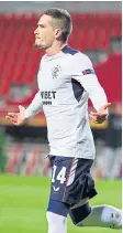  ??  ?? Ryan Kent celebrates after scoring Rangers’ third.