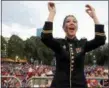  ?? ASSOCIATED PRESS FILE ?? 1st Lt. Alexandra Borza of the U.S. Army Field Band conducts the Soldiers’ Chorus during the annual Boston Pops Fireworks Spectacula­r on the Esplanade,