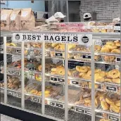  ??  ?? Above, in Tarrytown, a Bagel Emporium location sells your standard bagel fare as well as rainbow options. At left, a statue dedicated to the Headless Horseman in Sleepy Hollow, inspired by the Washington Irving tale.