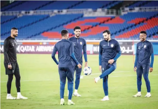  ?? Agence France-presse ?? ↑
Al Ain players take part in a team training session at Nissan Stadium in Yokohama.