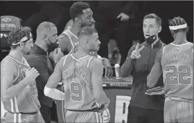  ?? Associated Press ?? Discussing matters: Brooklyn Nets head coach Steve Nash talks to Nets' Joe Harris (12), Jeff Green, Timothe Luwawu-Cabarrot (9) and Caris LeVert (22) during the second half of an NBA basketball game against the Oklahoma City Thunder Sunday in New York. The Thunder defeated the Nets 129-116.