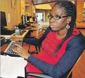  ?? $)3*4 4)"//0/ $"1& #3&50/ 1045 ?? Cape Breton University student Arinola Adefila studied in the university’s library Friday. She is taking summer courses as part of her MBA program. Originally from Nigeria, Adefila is one of about 900 internatio­nal students attending CBU. The future of...
