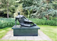  ?? Taking a break: Henry Moore’s Draped Reclining Woman outside the Sainsbury Centre for Visual Arts in Norwich ??