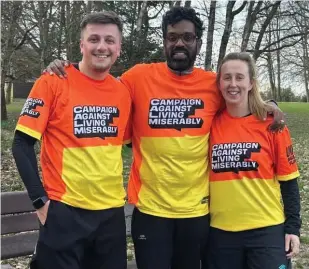  ?? ?? Romesh Ranganatha­n, who is a patron of Calm, with two of the mental health charity’s other runners, Natalie Clements and Luke Remfry