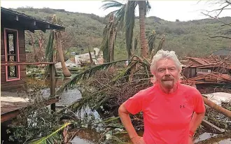  ?? Photo: Virgin.com/PA Wire ?? Richard Branson among the debris on his private island.