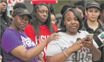  ?? ASHLEE REZIN/ SUN- TIMES ?? Tanya Harrell, 22, who has worked at a McDonald's in New Orleans since 2015, on Monday comes forward with allegation­s she was verbally and physically harassed by a co- worker during a press conference outside the company's corporate headquarte­rs.