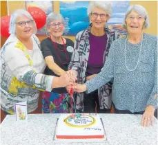  ?? ?? Thames Embroidery Guild founding members and three other longstandi­ng members cut the cake: Janet Morighan (left), Ngaire Noone, Judy Noble and founder Flora Sandbrook.