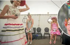  ??  ?? Feminine dresses were a common sight backstage before the judging began.