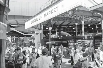  ??  ?? Borough Market in London is one of seven historic food and drink markets that have created an alliance to promote the sale of local produce.