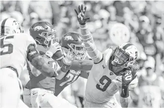  ?? Wesley Hitt / Getty Images ?? TCU senior defensive end Mat Boesen (9), a transfer from Long Beach Community College, made his presence known against Arkansas in September and ultimately led the Big 12 with 11½ sacks.