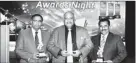  ??  ?? Picture from left - Aruna Kumarasing­he Executive Director, Gamini Saparamadu Chairman and Lal Kalupahana General Manager with the Asia Star Awards and the World Star Awards at the Lanka STAR Awards Ceremony - 2012 organized by the Sri Lanka Institute...