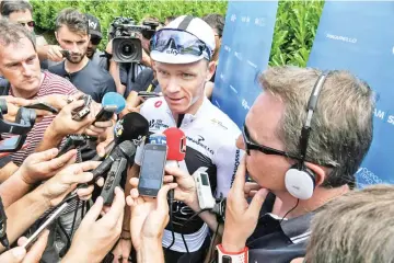  ?? — AFP photo ?? Chris Froome addresses the media outside his team's hotel in Chambery on Monday.