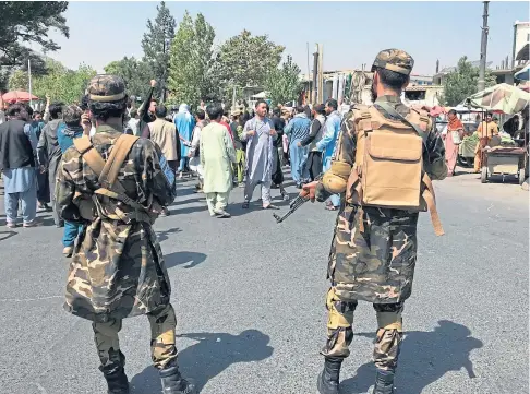  ??  ?? WARNING FIRE: The Taliban have used forcible action twice in the last week to stop demonstrat­ions in Kabul.