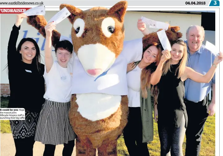  ??  ?? It could be you Hope the mascot joins Kilbryde Hospice staff in launching their big raffle