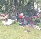  ??  ?? Rubbish in Sir Henry Parkes Road after travellers left illegal camp