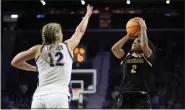  ?? CHARLIE RIEDEL — THE ASSOCIATED PRESS ?? Colorado guard Tameiya Sadler (2) shoots against Kansas State on Sunday in Manhattan, Kan.