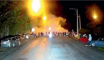  ??  ?? A group of boy racers caused havoc for locals on the corner of Tram and Jacksons roads in Ohoka on Saturday night, doing burnouts and drinking alcohol.