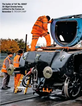  ?? TREVOR CAMP ?? The boiler of ‘A4’ No. 60007 Sir Nigel Gresley being refitted to the frames on November 7.