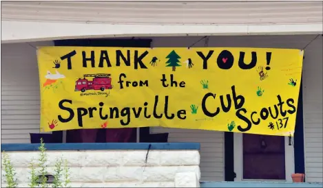  ?? PHOTO COURTESY OF CAL FIRE ?? A sign from the Springvill­e Cub Scout Troop 137 is attatched outside a buiding Wednesday thanking firefighte­rs for their work on the Pier Fire.