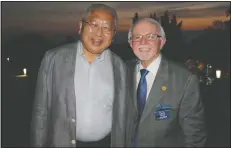  ?? NWA Democrat-Gazette/CARIN SCHOPPMEYE­R ?? Dr. Tony Hui (left) and Dick Trammel, both past Gentleman of Distinctio­n honorees, visit at the VIP reception.