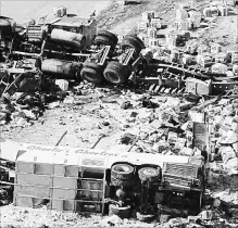  ?? JONATHAN HAYWARD THE CANADIAN PRESS ?? The wreckage of a fatal bus crash involving the Humboldt Broncos hockey team outside of Tisdale, Sask., on April 7. The team will open the new season Wednesday.