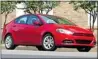  ?? Postmedia News file ?? Dodge Dart in race for award.