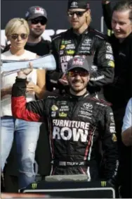  ?? MATT SLOCUM — THE ASSOCIATED PRESS ?? Martin Truex Jr. celebrates after winning the NASCAR Cup Series auto race at Watkins Glen Internatio­nal on Sunday.