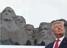  ?? ALEX BRANDON/AP ?? President Donald Trump smiles at Mount Rushmore National Memorial near Keystone, S.D., on Friday.