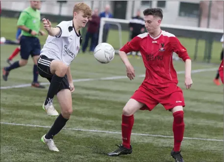  ??  ?? Owen Walsh in action with Real Tubber’s Mark Burke in IT Sligo. INSET: Enda McG owan, Cartron, races for possession with Real Tubber’s G avin Sweeney. Pics: Donal Hackett.