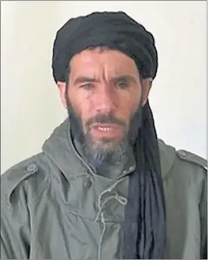  ??  ?? OUTLAW: Mokhtar Belmokhtar, a veteran Islamist fighter, has been killed in an air strike, say US officials.