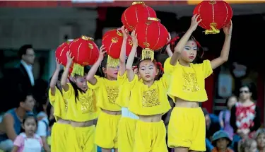  ?? PHOTO: DOMINICO ZAPATA/STUFF ?? Young dancers at Hamilton’s Lantern Festival. Nationally, the occasion has become the country’s biggest free event.