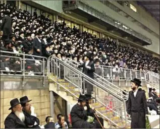  ??  ?? London Charedim turn out in force at an anti-internet rally at Leyton Orient stadium