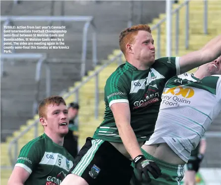  ?? ?? TUSSLE: Action from last year’s Connacht Gold Intermedia­te Football Championsh­ip semi-final between St Molaise Gaels and Bunninadde­n. St Molaise Gaels won by a point. The sides are meeting again in the county semi-final this Sunday at Markievicz Park.