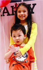  ??  ?? We made it: deena and Farish were unveiled as winners of Gap’s second regional children’s casting call at a recent bash in Kuala Lumpur. Their visages now grace the visuals of Gapkids and babygap stores nationwide for a month.